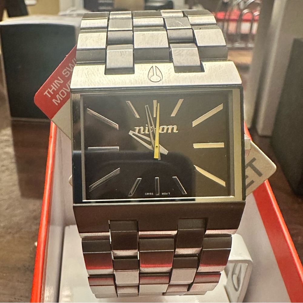 Nixon the Ticket Watch in Silver with Black Face